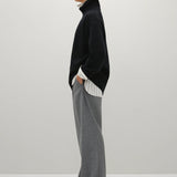 A Emery Gibson Funnel Knit in Black