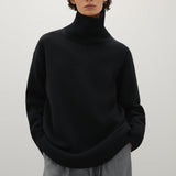 A Emery Gibson Funnel Knit in Black