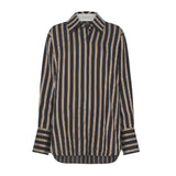A long-sleeved, striped black and bronze shirt by Camilla and Marc with a straight, boxy fit and drop shoulders. It features contrast sleeve cuffs and corozo buttons.