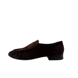 A chocolate brown suede loafer shoe with a low heel and no visible brand markings.