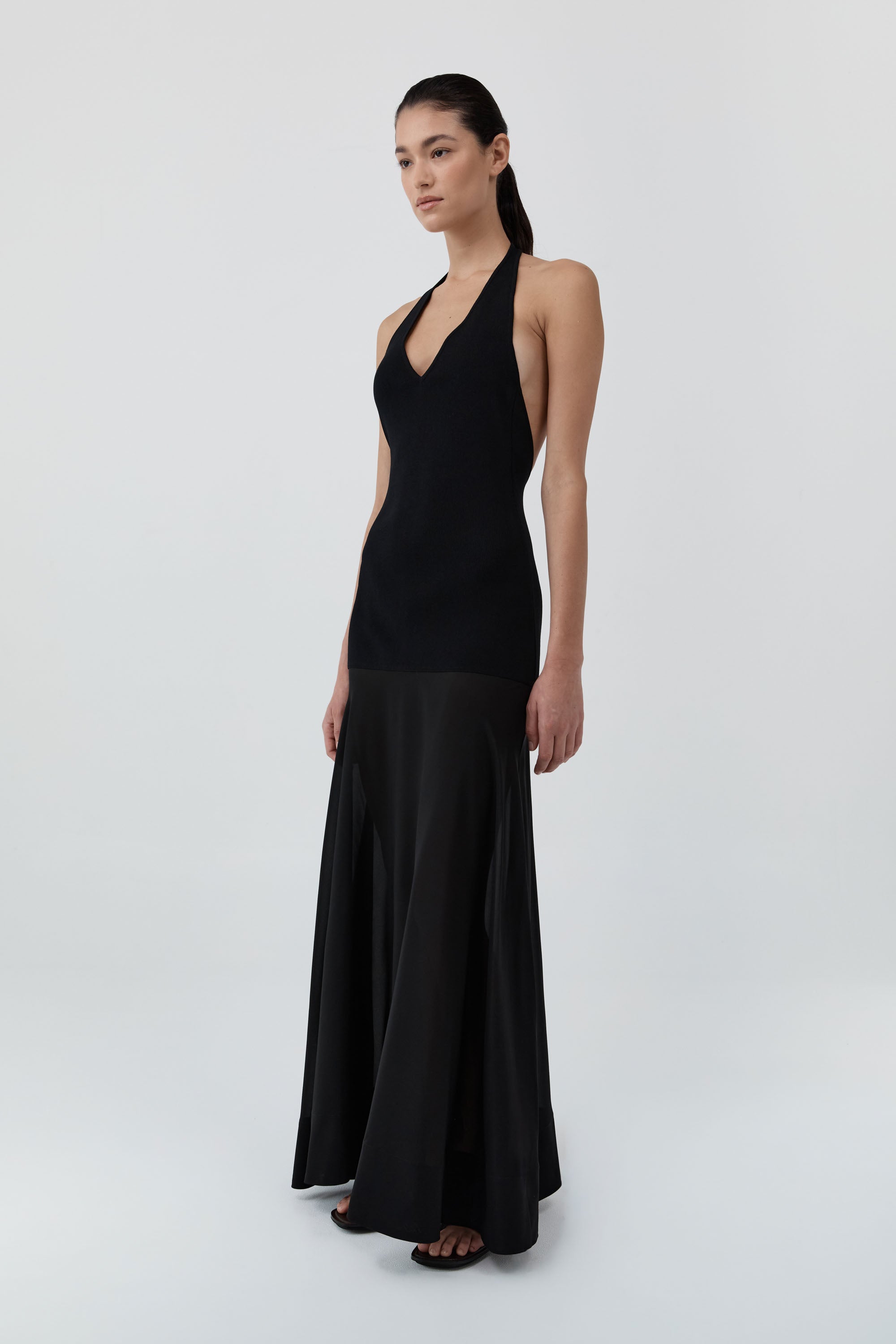 St Agni Circle Hem Halter Dress in Black - styled look