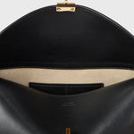 Toteme T-Lock Leather Clutch in Black