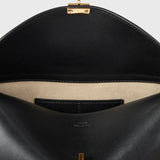 Toteme T-Lock Leather Clutch in Black