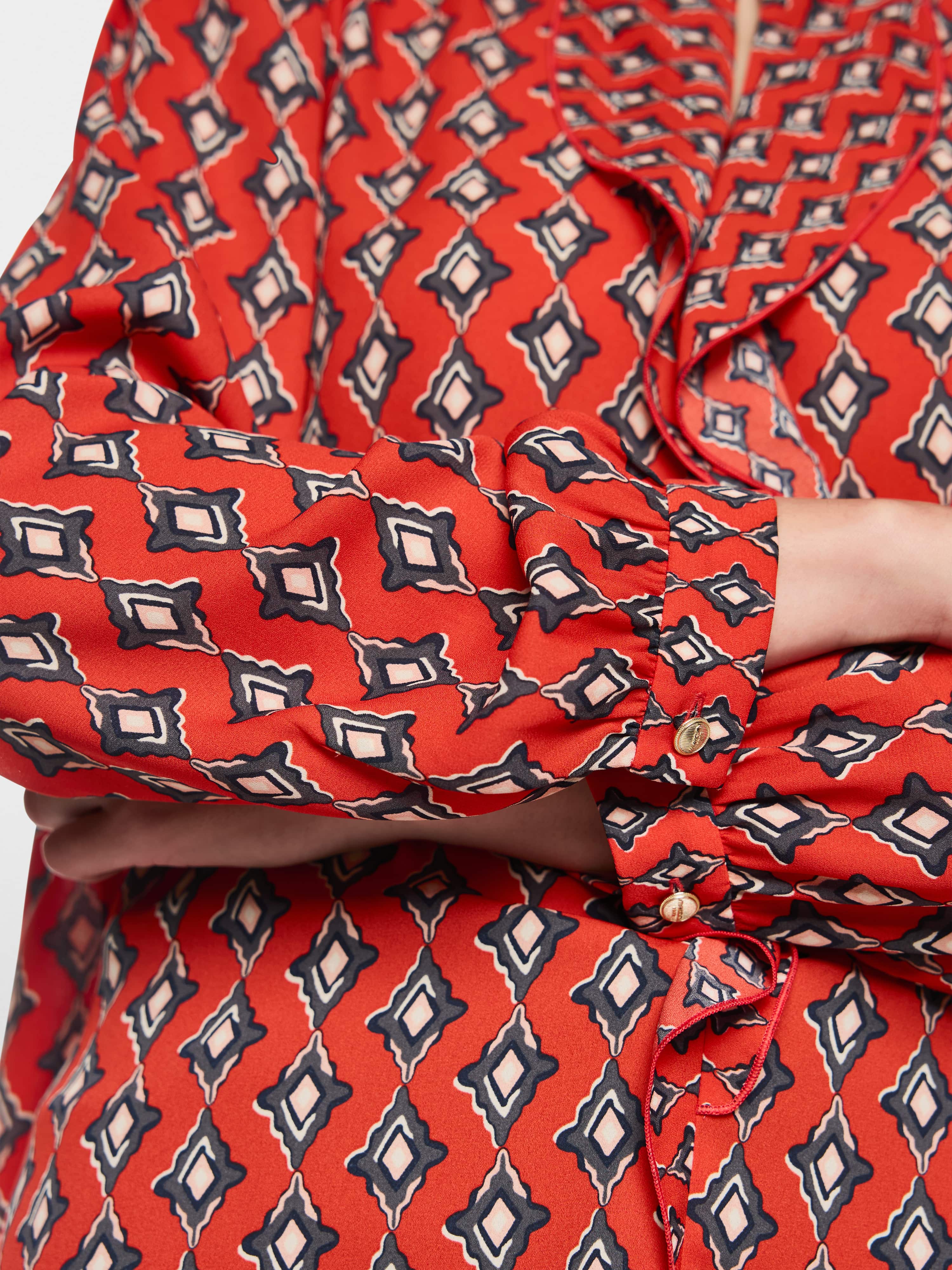 Marc Cain 5102 Blouse in Aurora Red - close up