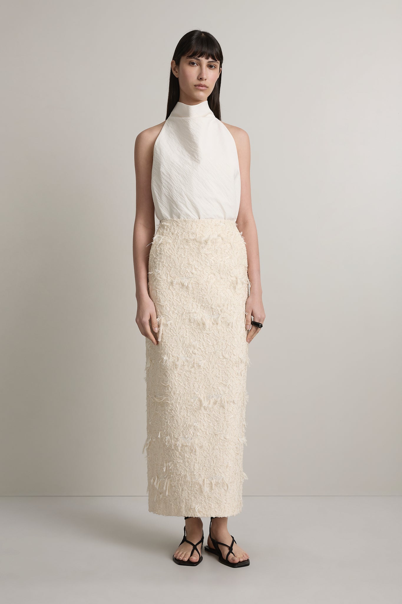 A Emery Innes Skirt in Creme Jacquard - side view