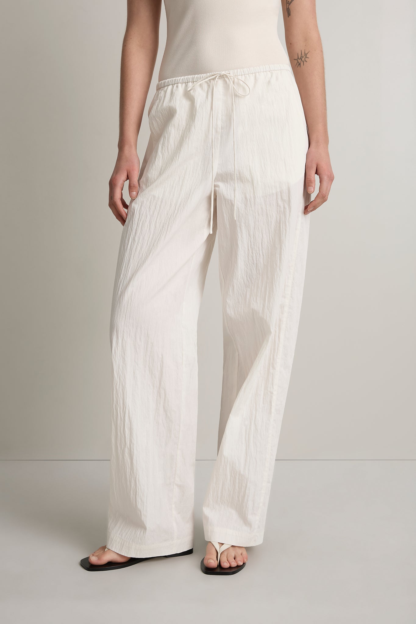A Emery Lore Pant in Chalk - detail view