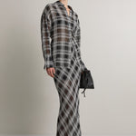 A Emery Reese Sheer Skirt in Black And White Check - side view