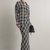 A Emery Reese Sheer Skirt in Black And White Check - side view