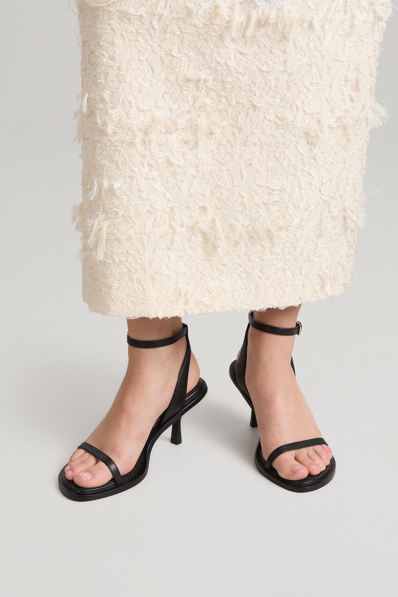 A Emery York Heeled Sandal in Black - styled look