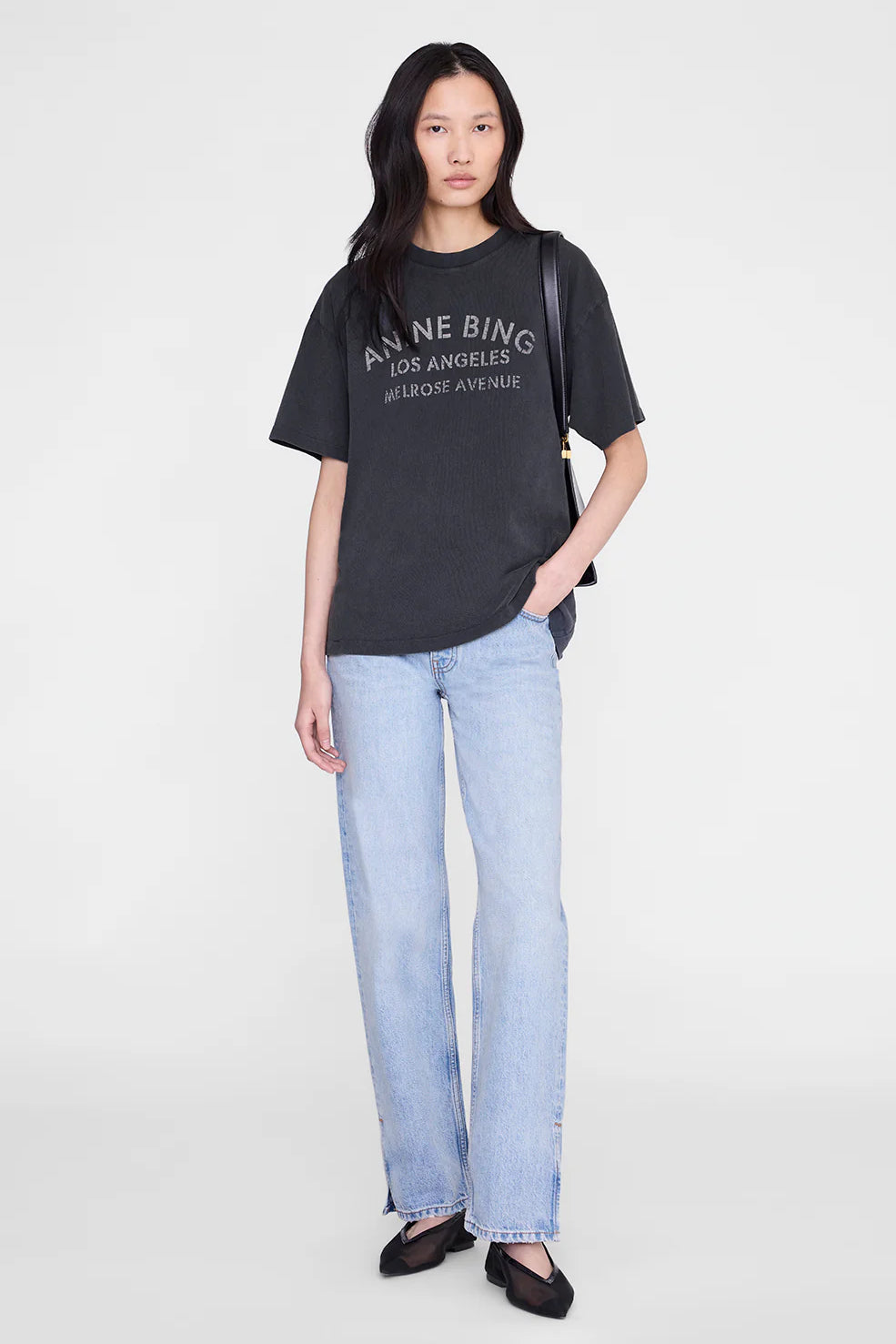 Anine Bing Cade Tee Melrose Stencil in Washed Black - side view