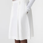 Bassike Crushed Cotton Box Pleat Skirt in Natural - styled look