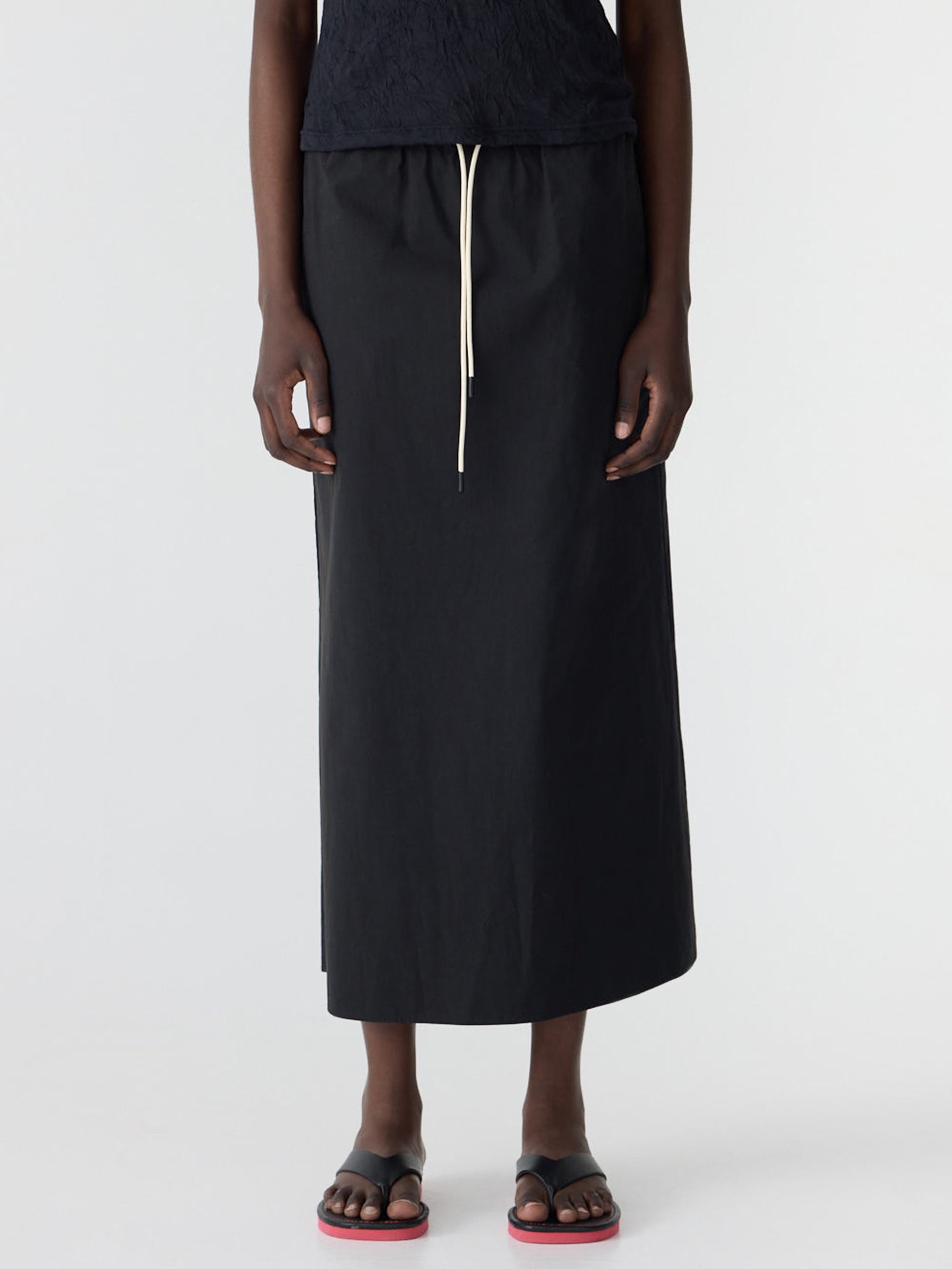 Bassike Crushed Cotton Minimal Skirt in Black - detail view