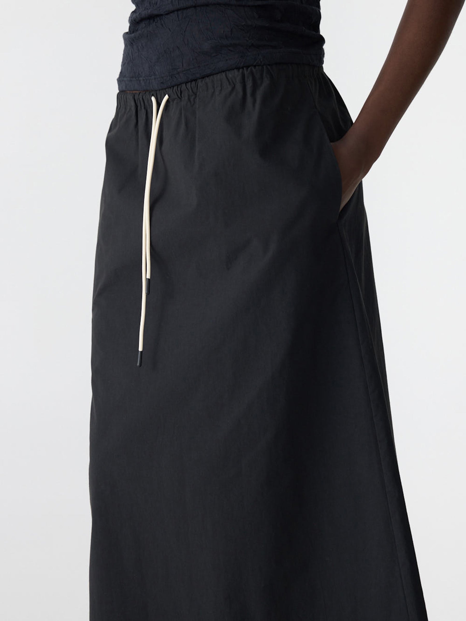 Bassike Crushed Cotton Minimal Skirt in Black - styled look