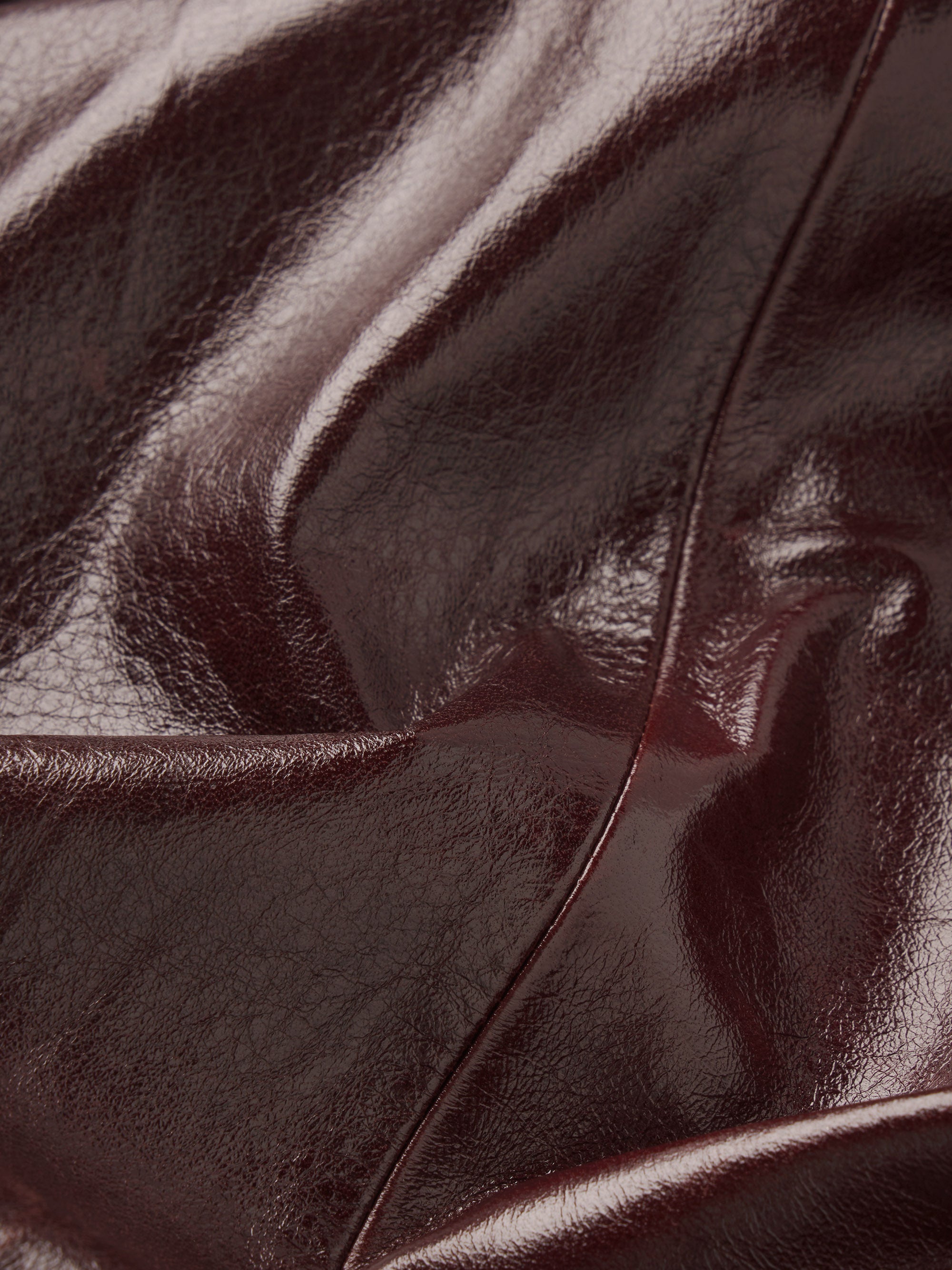 Frame The Veda Leather Skirt in Currant - close up