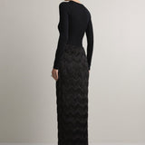 A Emery Innes Fringed Skirt in Black