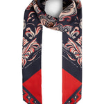 A silk scarf with a navy blue base, featuring a detailed beige and red paisley pattern on the top and a solid red geometric pattern on the bottom, displayed on a light gray background.