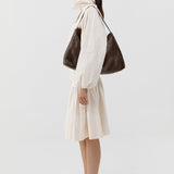 St Agni Woven Hobo Bag in Coffee - styled look