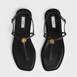 Toteme T-Strap Nappa Sandals in Black - outfit inspiration