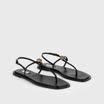 Toteme T-Strap Nappa Sandals in Black - styled look