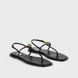 Toteme T-Strap Nappa Sandals in Black - styled look