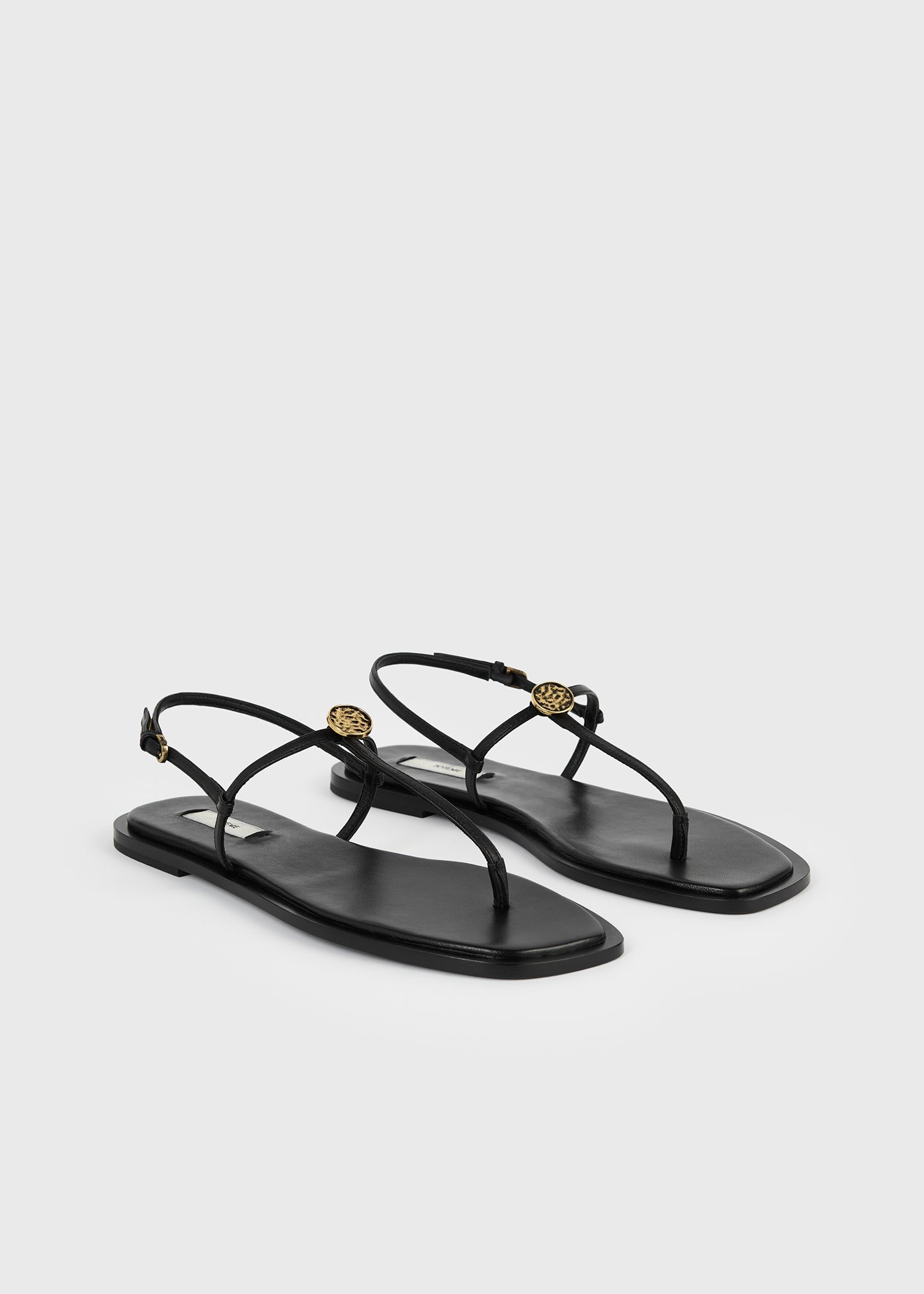 Toteme T-Strap Nappa Sandals in Black - styled look