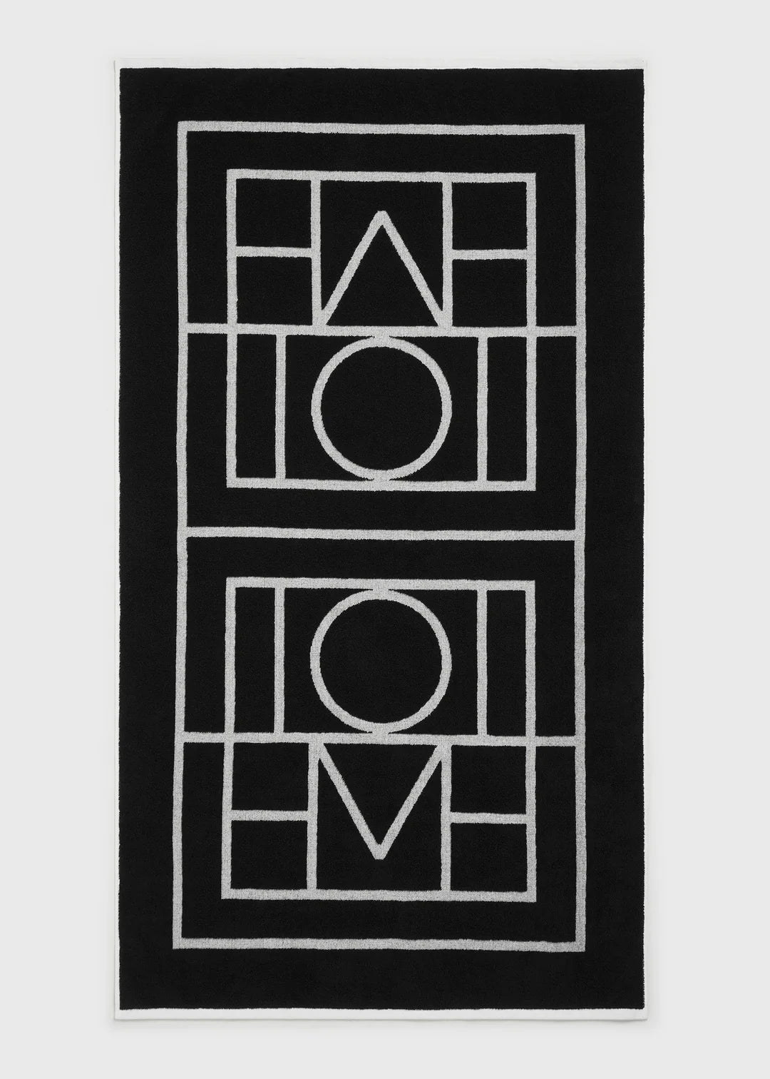 Toteme Monogram Beach Towel in Black and Tofu