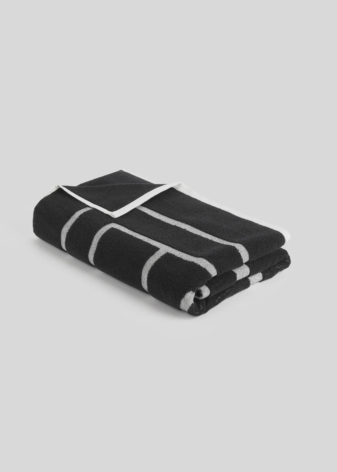 Toteme Monogram Beach Towel in Black and Tofu