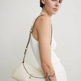 Toteme T-Lock Grained Leather Clutch in Milk