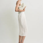 Toteme T-Lock Grained Leather Clutch in Milk