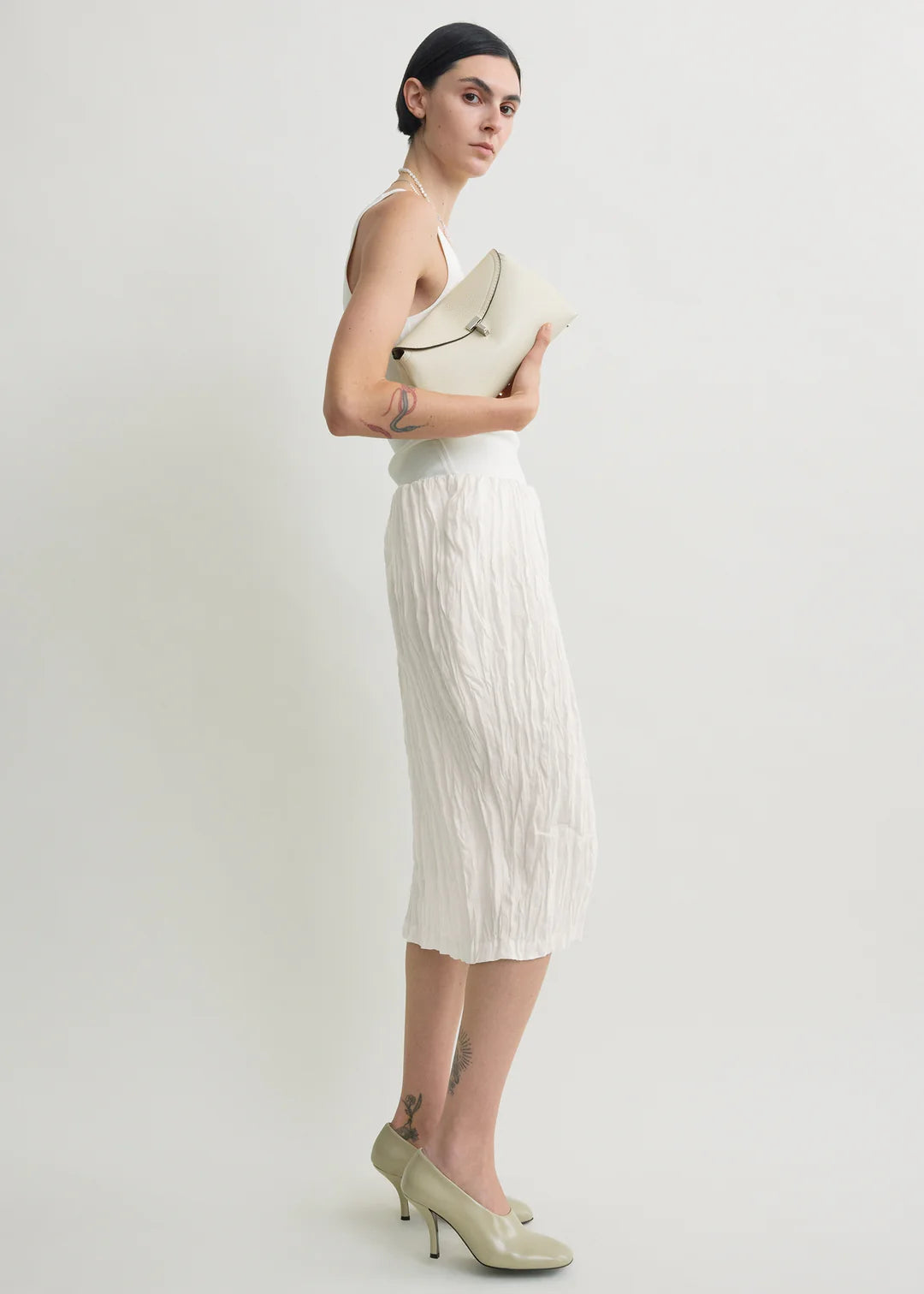 Toteme T-Lock Grained Leather Clutch in Milk