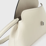 Toteme T-Lock Grained Leather Clutch in Milk