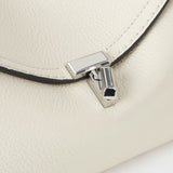 Toteme T-Lock Grained Leather Clutch in Milk