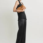 Toteme T-Lock Grained Leather Clutch in Tan