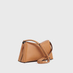 Toteme T-Lock Grained Leather Clutch in Tan