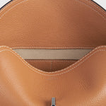 Toteme T-Lock Grained Leather Clutch in Tan
