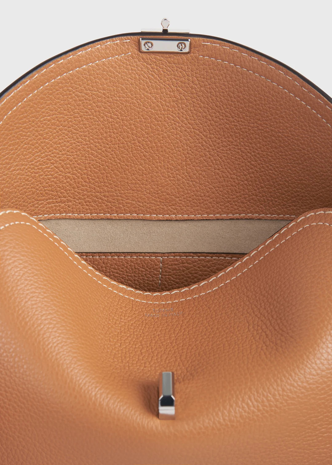 Toteme T-Lock Grained Leather Clutch in Tan