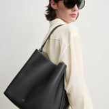 Toteme Medium Belted Grained-Leather Tote in Black - side view