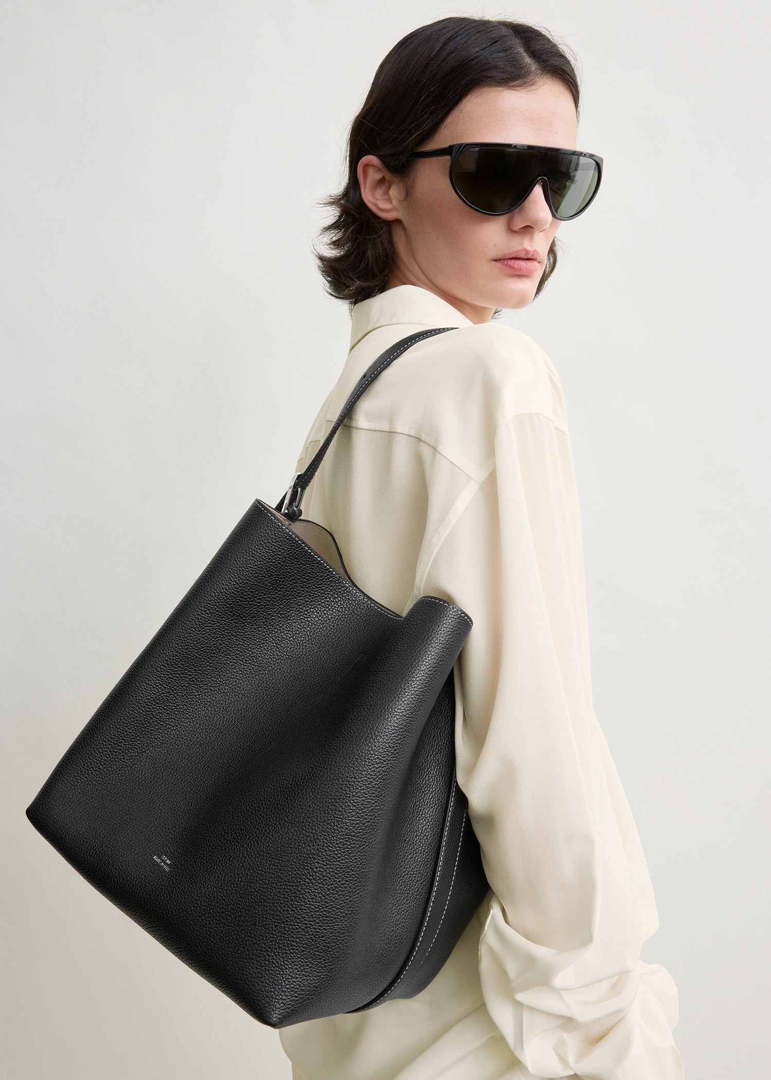Toteme Medium Belted Grained-Leather Tote in Black - side view