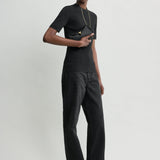 Toteme Mini T-Lock Pony Hair Clutch in Black