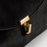 Toteme Mini T-Lock Pony Hair Clutch in Black