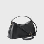 Toteme T-Lock Leather Top Handle in Black - styled look