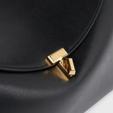 Toteme T-Lock Leather Top Handle in Black - close up