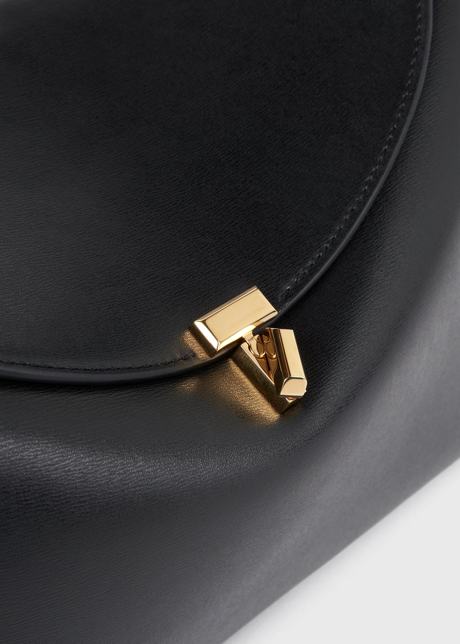 Toteme T-Lock Leather Top Handle in Black - close up