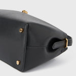 Toteme T-Lock Leather Top Handle in Black - close up