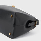 Toteme T-Lock Leather Top Handle in Black - close up