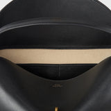 Toteme T-Lock Leather Top Handle in Black - close up