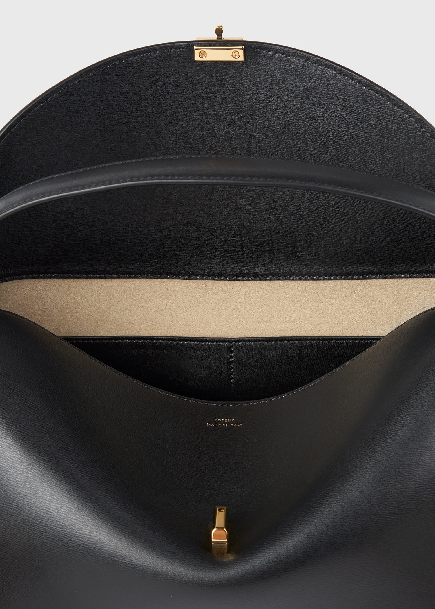 Toteme T-Lock Leather Top Handle in Black - close up