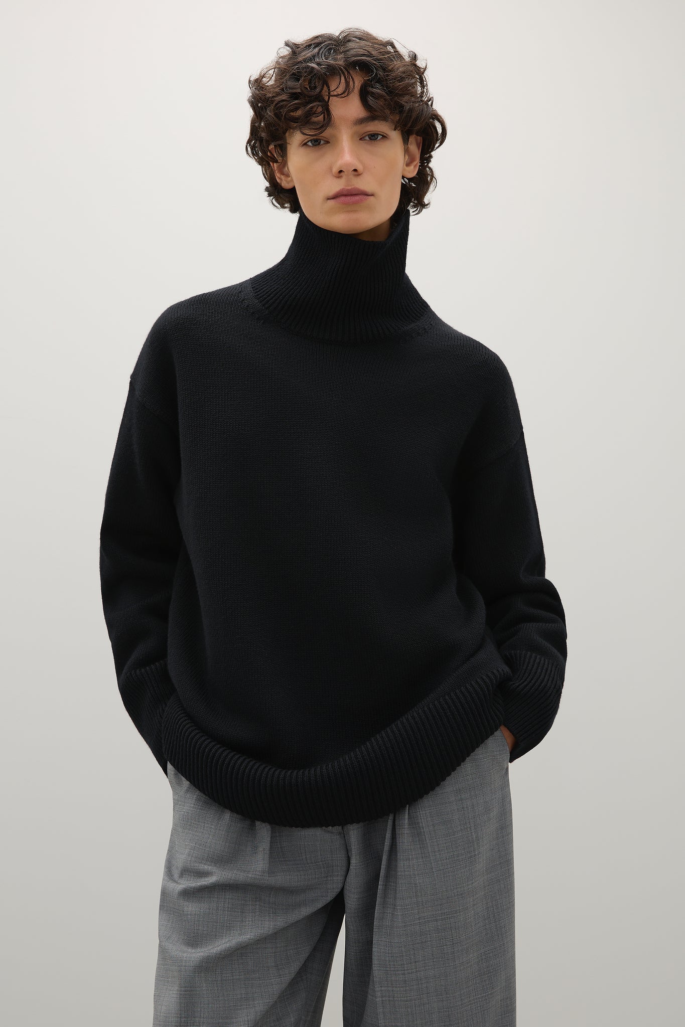 A Emery Gibson Funnel Knit in Black