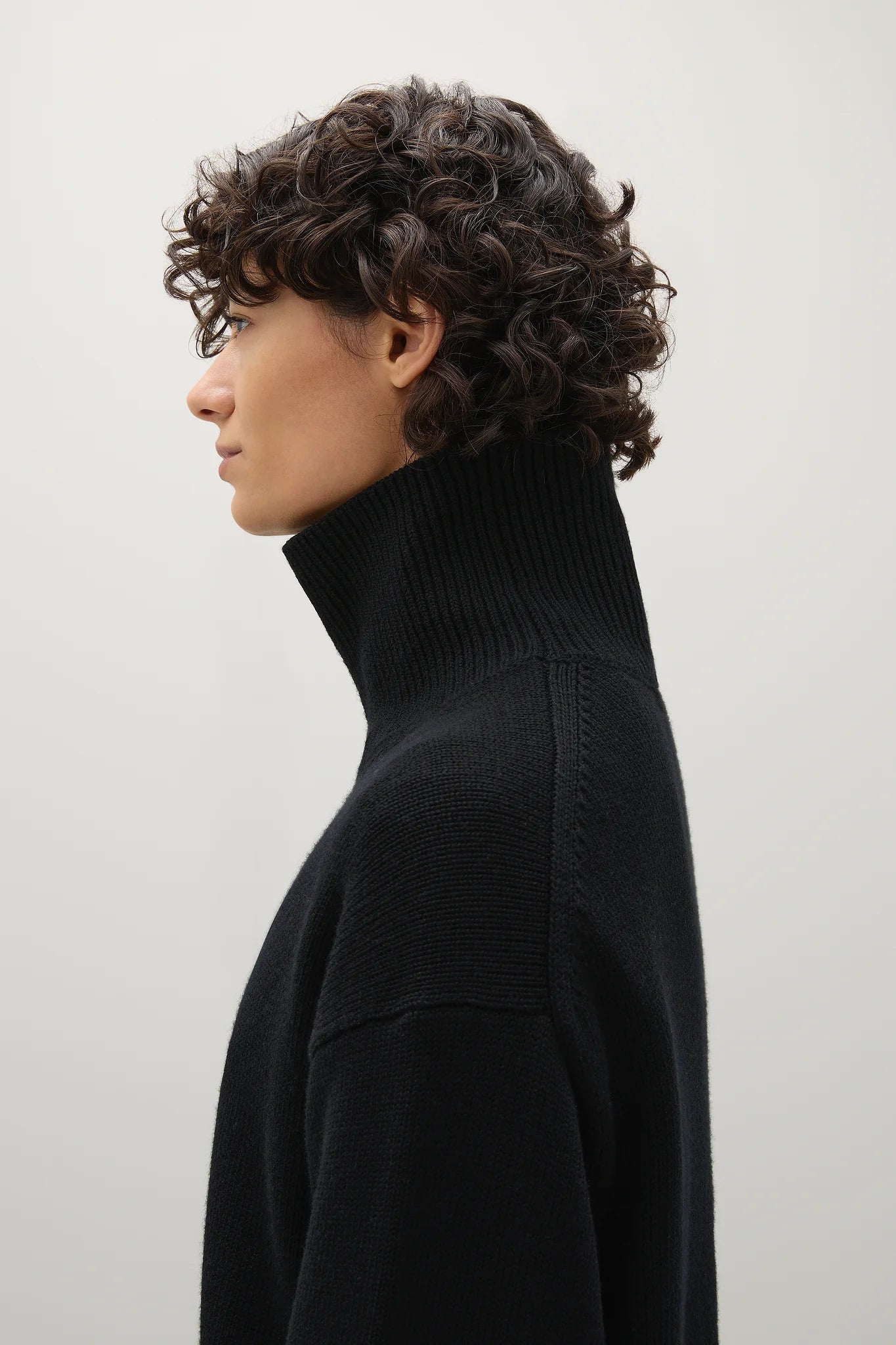 A Emery Gibson Funnel Knit in Black