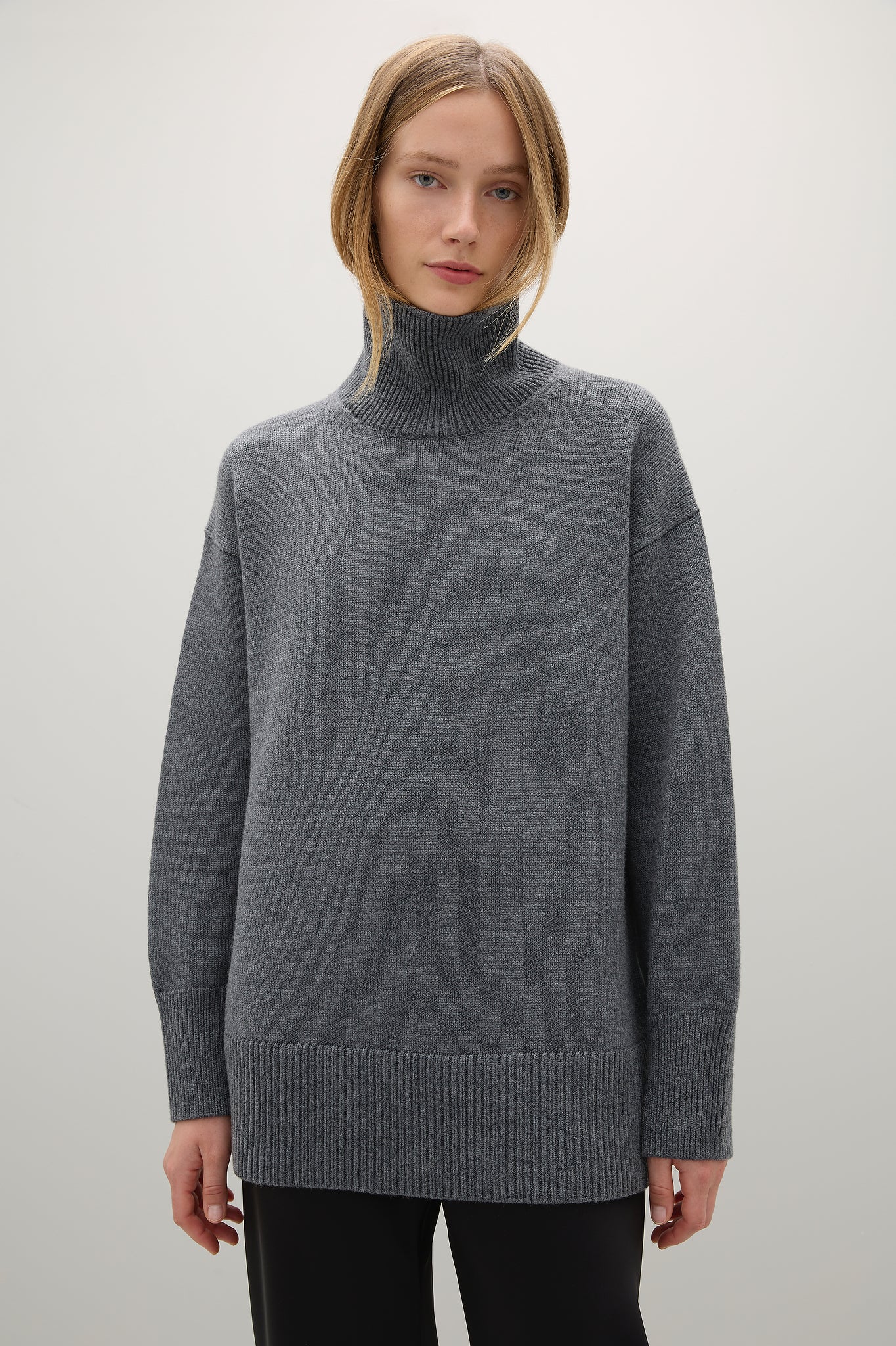 A Emery Gibson Funnel Knit in Mid Grey Melange